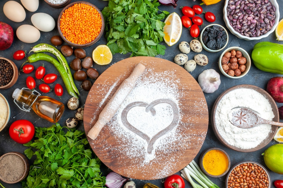 Fresh natural baking ingredients including flour, grains and produce
